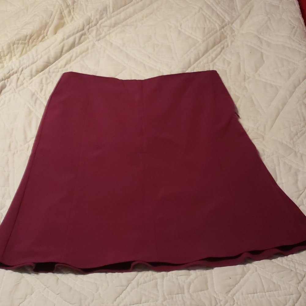 Wine colored skirt.